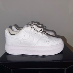 All white nike sneakers